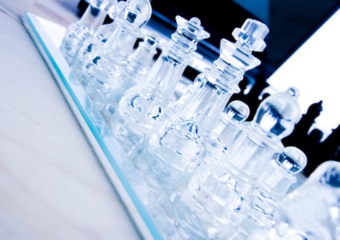Chess - a game for two people that is played on a board with 64 black and white squares called a chessboard.