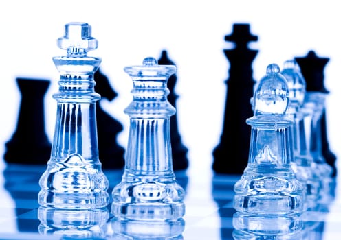 Chess - a game for two people that is played on a board with 64 black and white squares called a chessboard.