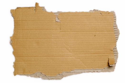 Torn section of a corrugated shipping carton. Background for writing / shipping.