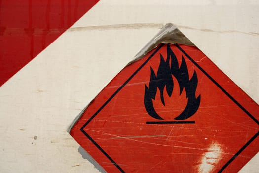 An abstract image of a grunge / weathered flammable symbol.