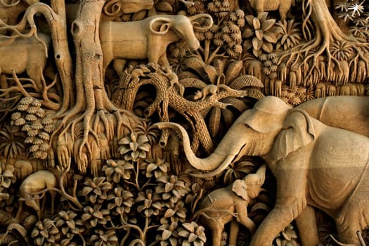 Section of an ancient mural wood carving from Thailand.