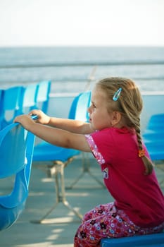 Cute girl makes trip with ship