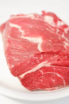 Raw beef meat on the plate