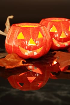 Halloween still life with small candle-lights