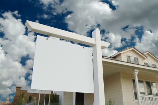 Blank For Sale Sign in Front of Beautiful New Home.