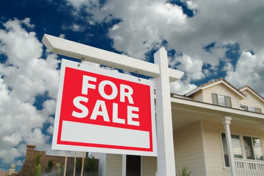 Home For Sale Sign in Front of Beautiful New Home.