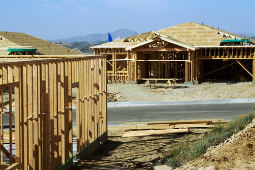 Construction site with new home framing.