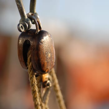 wood pulley on a sailing ship