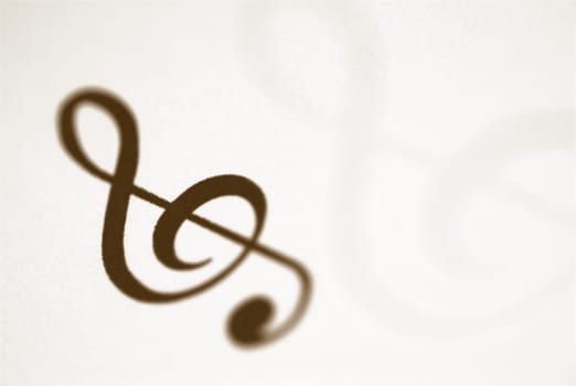 Treble Clef musical symbol on a sheet music