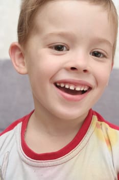 The person of the happy boy which smiles