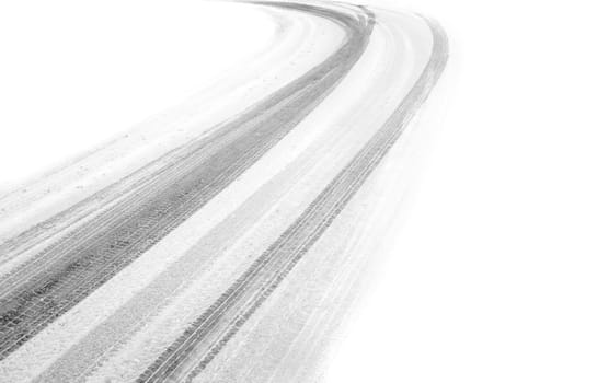 tire marks in the snow, fading to white on both sides