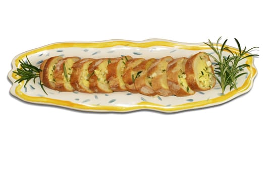 Preparation for making garlic bread. A series of pics in landscape and portrait format. Shallow and deep depth of field. This image contains a clipping path.