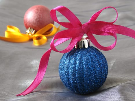 colorful christmas baubles with bows