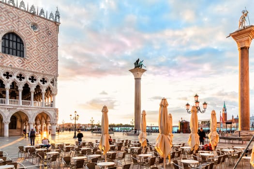 Venetian Cafe near Column of San Teodoro at sunrise, Venice, Italy.
