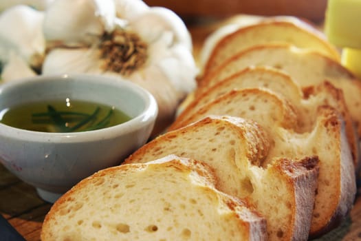 Preparation for making garlic bread. A series of pics in landscape and portrait format. Shallow and deep depth of field.