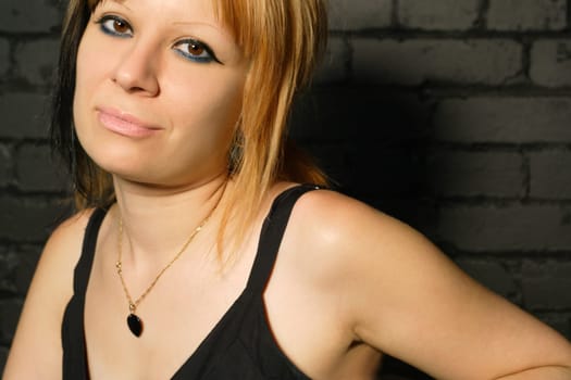Cristine smiling in the nightclub.