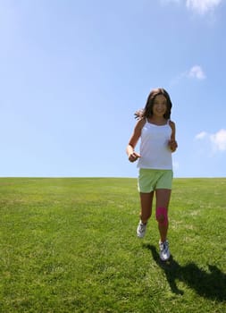 Happy girl on grass
