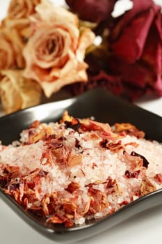 Bath salt with dry rose petals