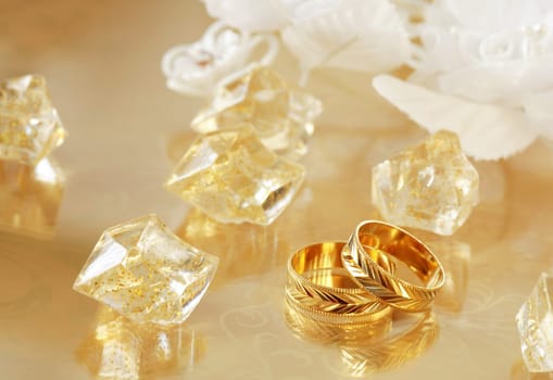 Golden wedding rings in yellow and golden tone