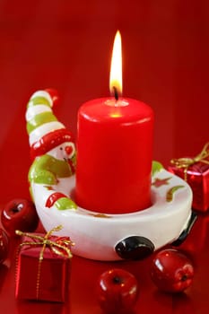 Christmas candle in red tone