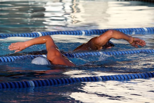 Two Swimmers in a swimming pool