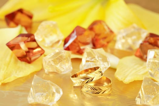 Golden wedding rings in yellow and golden tone