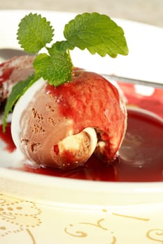 Delicious ice cream with strawberry liqueur