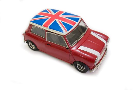 This is a red uk car from the sixties
