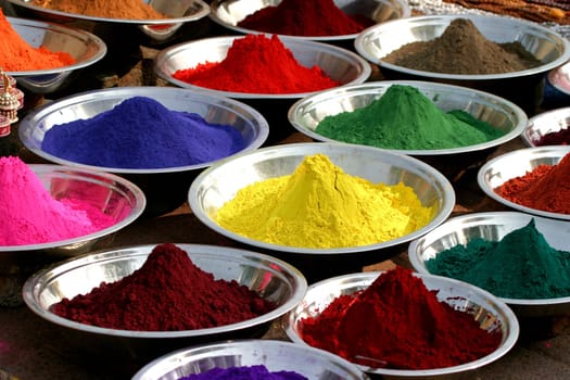 colourful tika powders on market in India