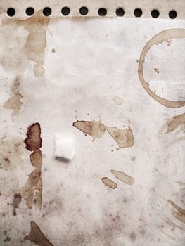 Grunge background in sepia tone with stains and markings