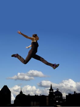 Young woman flying above the city