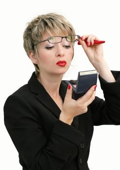 Businesswoman checking her makeup