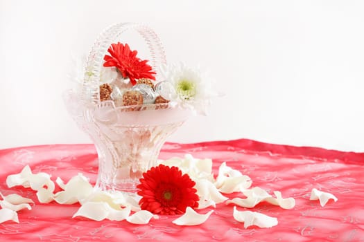 Romantic arrangement with candies and pralines