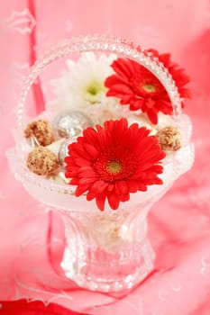 Romantic arrangement with candies and pralines