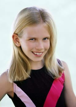 Happy smiling blond girl with blue eyes