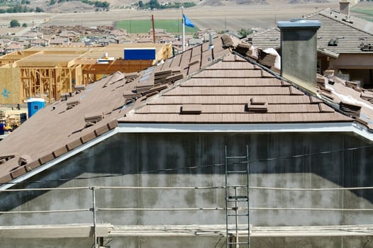 New Home Construction Site, Tiled Roof & Scaffolding.