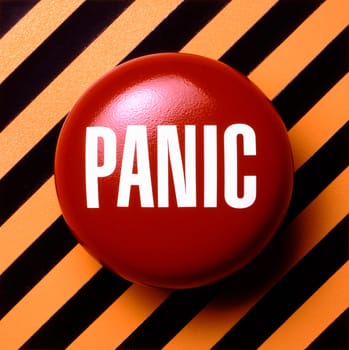 Panic button in red and white on orange and black background