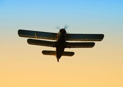 Old Antonov An-2 biplane in early morning