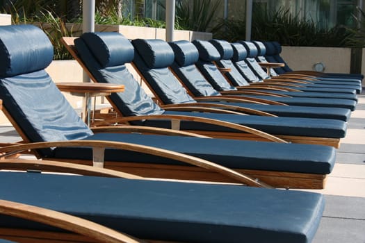 Poolside lounge chairs.