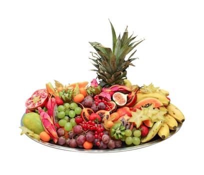 huge exotic fruit platter from buffet isolated on white