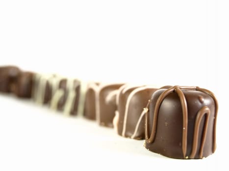 row of chocolate truffles candy