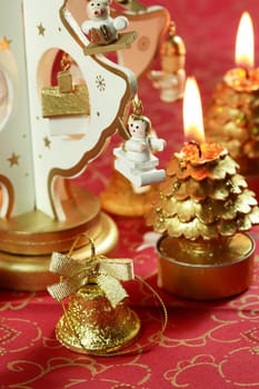 Christmas detail with small Christmas tree and candles