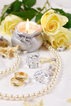 Wedding still life with beautiful golden rings