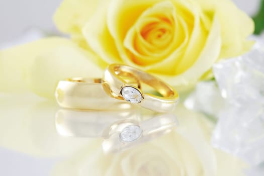 Wedding still life with beautiful golden rings