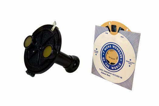 Antique View Master with reel isolated on white.