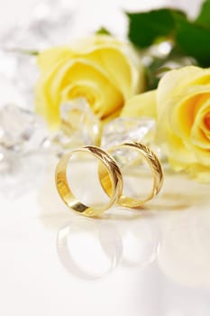 Wedding still life with beautiful golden rings