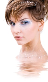 snow girl standing in the icy water