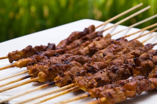 photo of asian food delicious chicken satay skewer