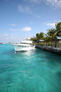 Ship in the Maldives cruising between the reef