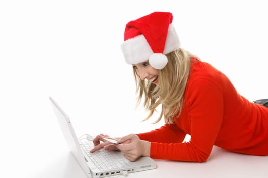 Excited  smiling female saving her legs and some dollars by purchasing gifts from online e-tailers or auctions.